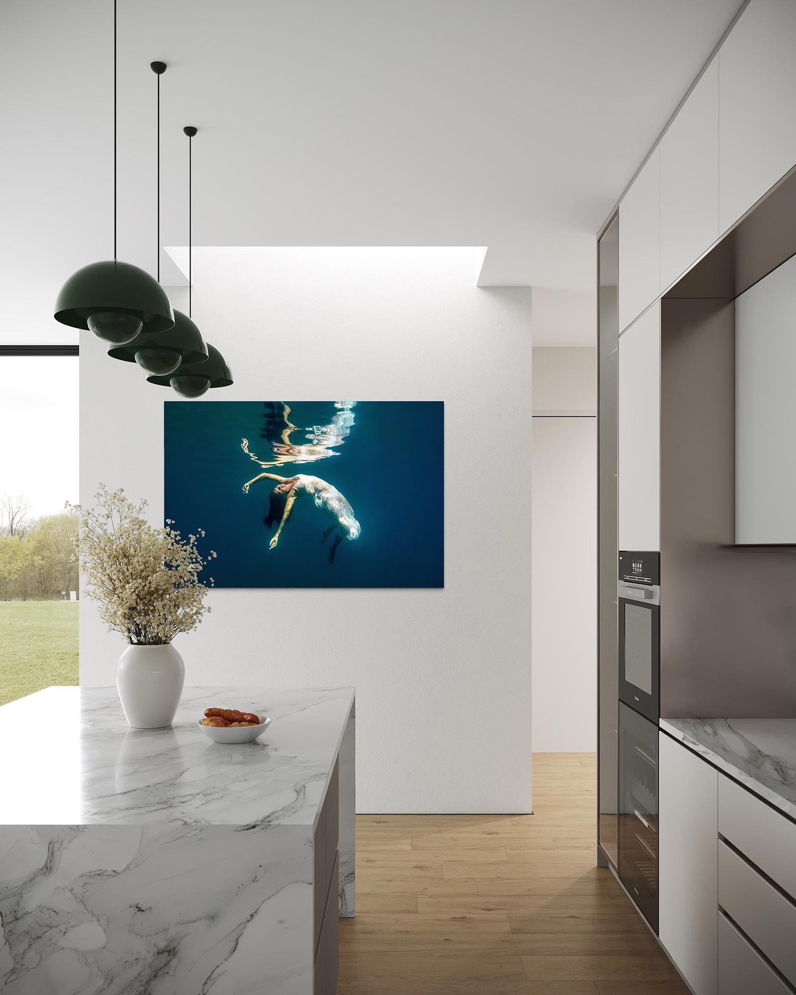 Underwater fine art photograph styled as wall art in a modern kitchen interior.